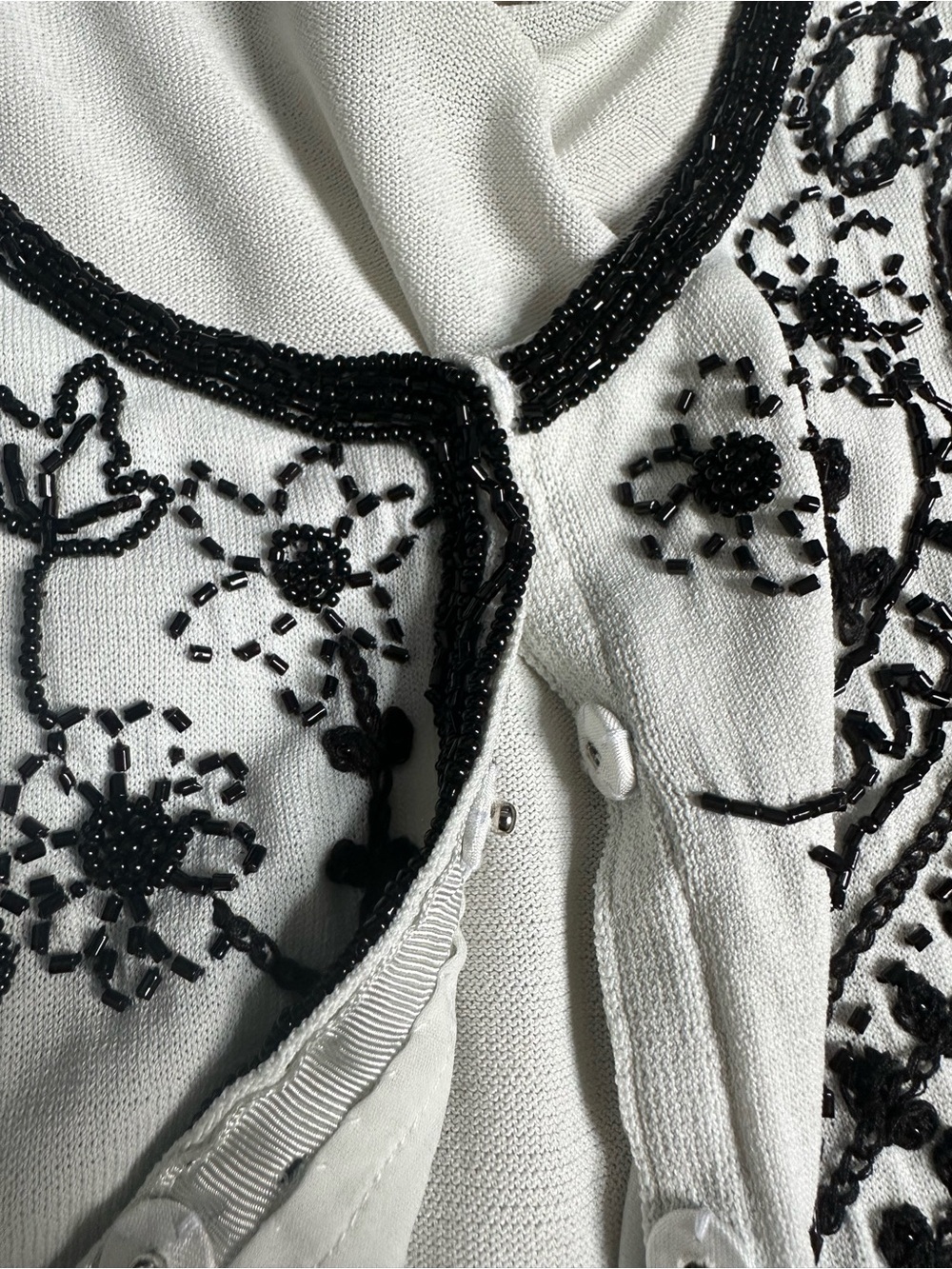 Maliparmi White Cardigan with Black Embroidered Floral Motif